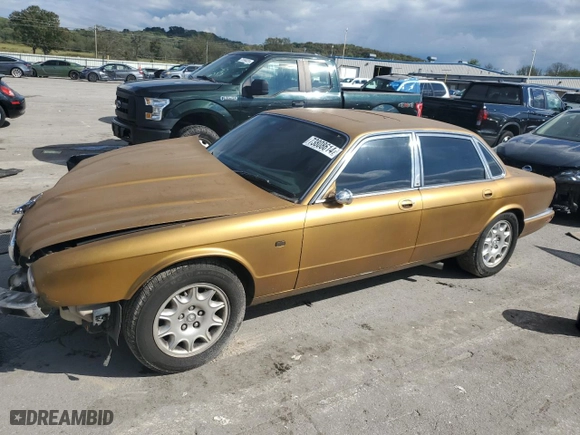 2001 Jaguar XJ with VIN SAJDA14C81LF27992, listed as a Copart auction lot 73808614 with 71,749 mi miles and Salvage Title. Bid and sale history available at carsss.com. Image 1.
