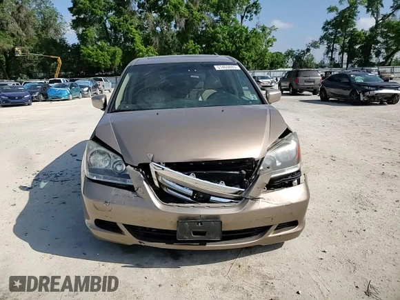 2007 Honda Odyssey EX-L z VIN 5FNRL38607B418045, wystawiony jako Copart lot #51469885 z przebiegiem 180 108 mil mil oraz Szkoda całkowita • Salvage title. Historia ofert i sprzedaży dostępna na DreamBid. Obrazek 11.