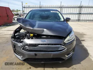 2015 Ford Focus Titanium с VIN 1FADP3J2XFL200668, выставлен на аукционе Copart как лот 54010865 с пробегом 138 459 миль миль и Списание • Salvage title. История ставок и продаж доступна на DreamBid. Изображение 5.