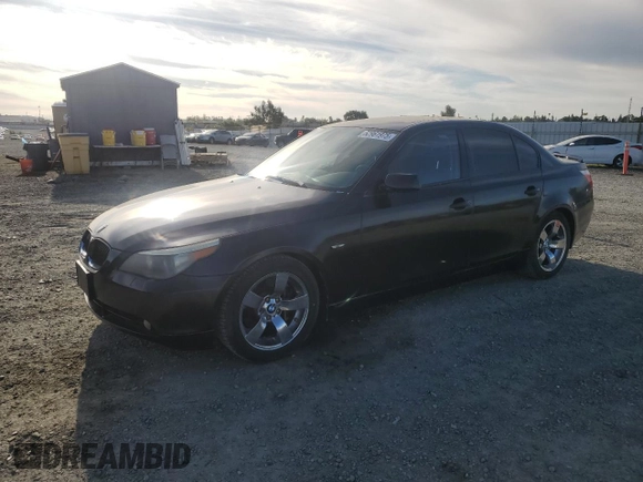 2005 BMW 5 Series 545i with VIN WBANB33565CN65980, listed as a Copart auction lot 52961975 with 143,772 mi miles and Salvage Title. Bid and sale history available at carsss.com. Image 1.