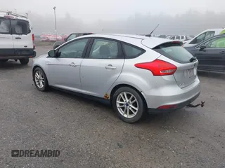 2015 Ford Focus SE with VIN 1FADP3K2XFL364856, listed as a IAAI auction lot 42190028 with 170,436 mi miles. Bid and sale history available at carsss.com. Image 3.