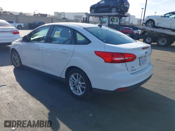 2016 Ford Focus SE with VIN 1FADP3F25GL339312, listed as a IAAI auction lot 41758115 with 77,972 mi miles. Bid and sale history available at carsss.com. Image 3.