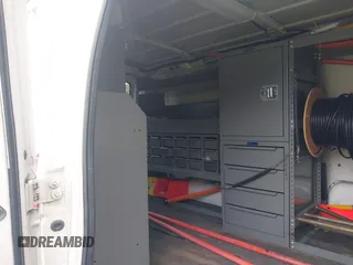 2011 Ford Econoline Cargo Commercial with VIN 1FTNE2ELXBDA18412, listed as a IAAI auction lot 42328684 with 115,484 mi miles and . Bid and sale history available at DreamBid. Image 8.