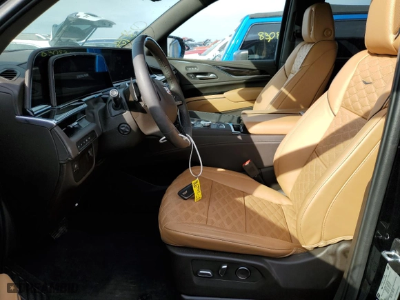 2024 Cadillac Escalade Premium Luxury with VIN 1GYS4BKL5RR109928, listed as a Copart auction lot 76373354 with 4,962 mi miles and Non Repairable. Bid and sale history available at carsss.com. Image 7.