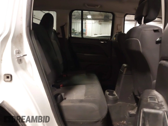 2014 Jeep Patriot Sport with VIN 1C4NJPBA6ED563281, listed as a IAAI auction lot 42392464 with 144,880 mi miles and . Bid and sale history available at DreamBid. Image 8.