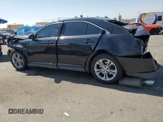 2015 Ford Taurus SEL with VIN 1FAHP2E86FG130511, listed as a Copart auction lot 60545805 with 99,215 mi miles and Salvage title. Bid and sale history available at DreamBid. Image 2.