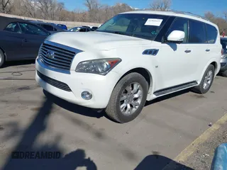 2014 Infiniti QX80 with VIN JN8AZ2NE8E9064773, listed as a IAAI auction lot 41902629 with 142,331 mi miles. Bid and sale history available at carsss.com. Image 2.