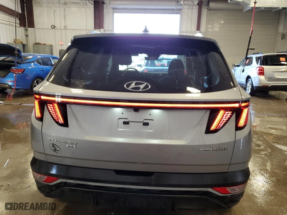 2022 Hyundai Tucson Hybrid Blue with VIN KM8JBCA13NU045713, listed as a Copart auction lot 48371525 with 13,848 mi miles and Salvage Title. Bid and sale history available at carsss.com. Image 6.