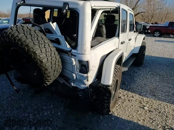 2022 Jeep Wrangler Unlimited Rubicon with VIN 1C4HJXFG6NW184670, listed as a Copart auction lot 84152964 with 31,459 mi miles and Salvage title. Bid and sale history available at DreamBid. Image 11.