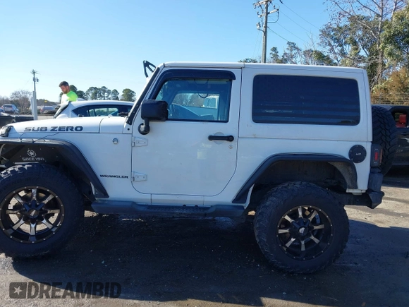2014 Jeep Wrangler Sport with VIN 1C4AJWAG0EL245337, listed as a IAAI auction lot 41532314 with 140,721 mi miles and . Bid and sale history available at DreamBid. Image 14.
