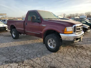 1999 Ford Super Duty F-250 XL with VIN 1FTNF21F9XEE67871, listed as a Copart auction lot 85012924 with 179,341 mi miles and Salvage Title. Bid and sale history available at carsss.com. Image 4.