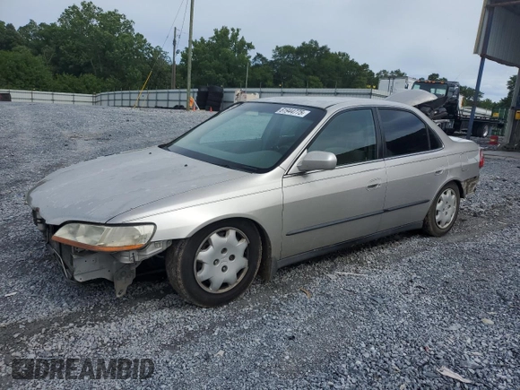 1998 Honda Accord LX with VIN 1HGCG5548WA156745, listed as a Copart auction lot 61944775 with 357,402 mi miles and Salvage title. Bid and sale history available at DreamBid. Image 1.