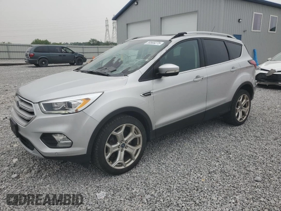 2019 Ford Escape Titanium with VIN 1FMCU9J90KUA07976, listed as a Copart auction lot 59565275 with 189,655 mi miles and Salvage title. Bid and sale history available at DreamBid. Image 1.