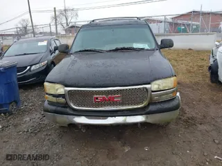 2003 GMC Yukon SLT with VIN 1GKEK13Z73J168530, listed as a IAAI auction lot 41437155 with 1 mi miles. Bid and sale history available at carsss.com. Image 6.