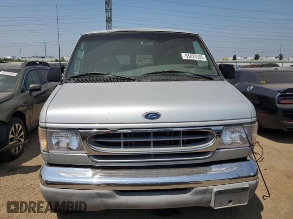 2002 Ford Econoline Passenger XL with VIN 1FBSS31L52HB63264, listed as a Copart auction lot 65820305 with 196,865 mi miles and Clean title. Bid and sale history available at DreamBid. Image 5.