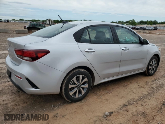 2023 Kia Rio S z VIN 3KPA24AD7PE513688, wystawiony jako Copart lot #54171675 z przebiegiem 14 131 mil mil oraz Szkoda całkowita • Salvage title. Historia ofert i sprzedaży dostępna na DreamBid. Obrazek 3.