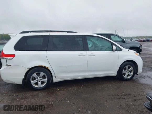 2012 Toyota Sienna LE AAS with VIN 5TDKK3DC3CS208853, listed as a IAAI auction lot 42205012 with 197,286 mi miles. Bid and sale history available at carsss.com. Image 13.