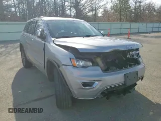 2021 Jeep Grand Cherokee 80th Anniversary with VIN 1C4RJFBG7MC665757, listed as a Copart auction lot 52443235 with 99,828 mi miles and Salvage Title. Bid and sale history available at DreamBid. Image 12.