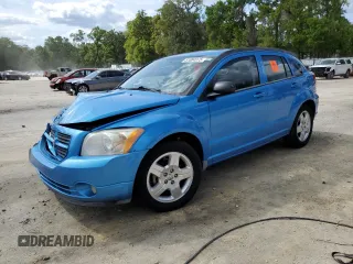 2009 Dodge Caliber SXT with VIN 1B3HB48A59D164675, listed as a Copart auction lot 51084975 with 115,330 mi miles and Salvage Title. Bid and sale history available at carsss.com. Image 1.