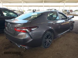 2022 Toyota Camry SE with VIN 4T1G11AK8NU685930, listed as a IAAI auction lot 41711373 with 66,634 mi miles and . Bid and sale history available at DreamBid. Image 4.