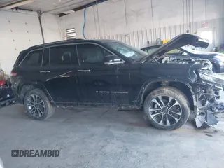 2023 Jeep Grand Cherokee Overland with VIN 1C4RJHDG5PC507978, listed as a IAAI auction lot 41394199 with 57,323 mi miles and . Bid and sale history available at DreamBid. Image 13.