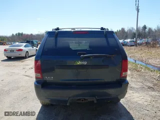 2008 Jeep Grand Cherokee Laredo with VIN 1J8GR48K98C161239, listed as a IAAI auction lot 42090850 with 218,063 mi miles. Bid and sale history available at carsss.com. Image 15.