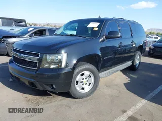 2012 Chevrolet Suburban LT with VIN 1GNSCJE00CR226285, listed as a IAAI auction lot 42059936 with 318,948 mi miles. Bid and sale history available at carsss.com. Image 2.