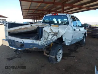 2006 Dodge 1500 SLT with VIN 1D7HU18N56S525572, listed as a IAAI auction lot 42106810 with 174,868 mi miles. Bid and sale history available at carsss.com. Image 4.