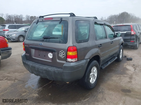 2005 Ford Escape XLS Value with VIN 1FMYU92Z35KA20497, listed as a IAAI auction lot 41509893 with 149,866 mi miles. Bid and sale history available at carsss.com. Image 4.