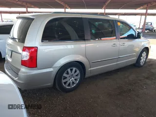 2012 Chrysler Town & Country Touring-L with VIN 2C4RC1CG7CR237270, listed as a IAAI auction lot 41858884 with 187,929 mi miles. Bid and sale history available at carsss.com. Image 4.
