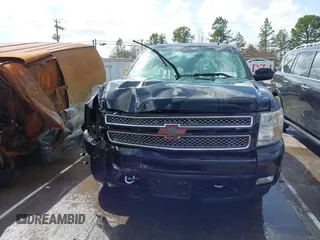 2013 Chevrolet Silverado 1500 LT with VIN 3GCPKSE71DG329253, listed as a IAAI auction lot 41723597 with 164,539 mi miles. Bid and sale history available at carsss.com. Image 12.