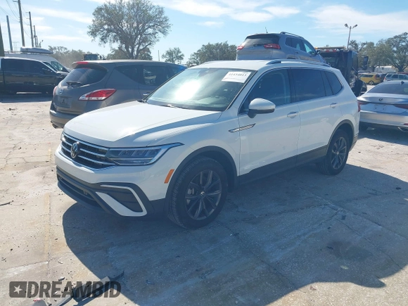 2024 Volkswagen Tiguan SE with VIN 3VV2B7AX7RM048615, listed as a IAAI auction lot 41434013 with 21,041 mi miles and . Bid and sale history available at DreamBid. Image 2.