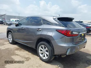 2016 Lexus RX 350 z VIN 2T2ZZMCAXGC031079, wystawiony jako IAAI lot #42120190 z przebiegiem 142 407 mil mil oraz . Historia ofert i sprzedaży dostępna na DreamBid. Obrazek 3.
