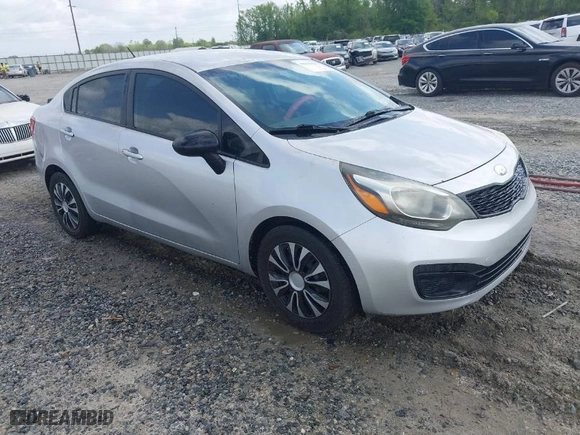 2015 Kia Rio LX with VIN KNADM4A32F6500489, listed as a IAAI auction lot 41943956 with 195,493 mi miles. Bid and sale history available at carsss.com. Image 1.