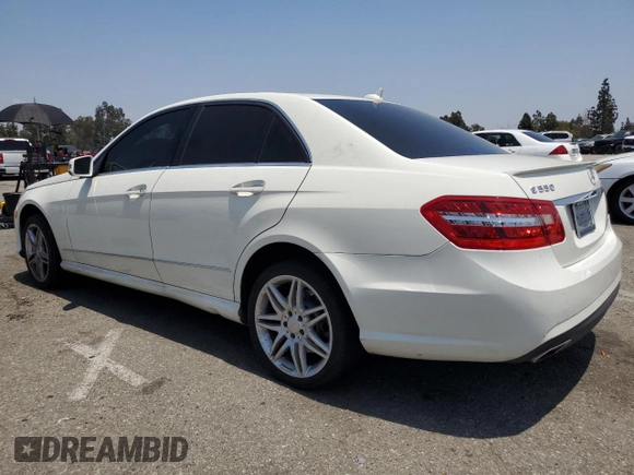 2011 Mercedes-Benz E 550 Luxury with VIN WDDHF7CB7BA422180, listed as a Copart auction lot 60174975 with 104,521 mi miles and Salvage title. Bid and sale history available at DreamBid. Image 2.