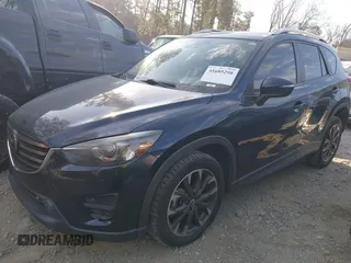 2016 Mazda CX-5 Grand Touring with VIN JM3KE2DY1G0708572, listed as a IAAI auction lot 41685298 with 109,427 mi miles. Bid and sale history available at carsss.com. Image 17.