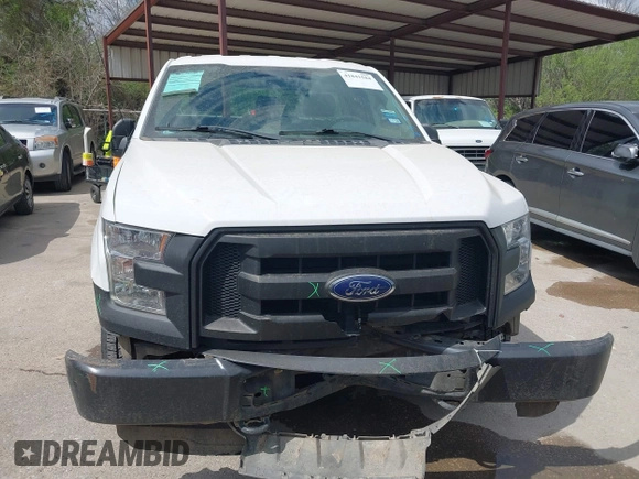 2015 Ford F-150 XL with VIN 1FTMF1E84FKD12758, listed as a IAAI auction lot 41841584 with 59,950 mi miles and . Bid and sale history available at DreamBid. Image 6.