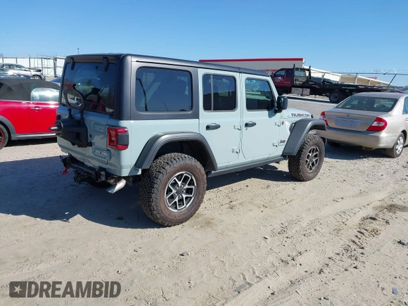 2024 Jeep Wrangler Rubicon with VIN 1C4PJXFG5RW268447, listed as a IAAI auction lot 41887497 with 3,005 mi miles. Bid and sale history available at carsss.com. Image 4.
