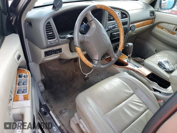 2001 Infiniti QX4 z VIN JNRDR09X61W204050, wystawiony jako Copart lot #78048074 z przebiegiem Nie podano mil oraz Szkody całkowita. Historia ofert i sprzedaży dostępna na DreamBid. Obrazek 8.