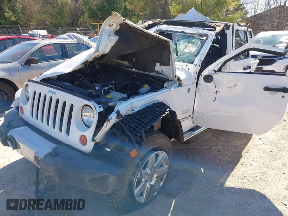 2013 Jeep Wrangler Unlimited Moab with VIN 1C4HJWEG7DL569862, listed as a IAAI auction lot 42095535 with Not provided miles and . Bid and sale history available at DreamBid. Image 2.