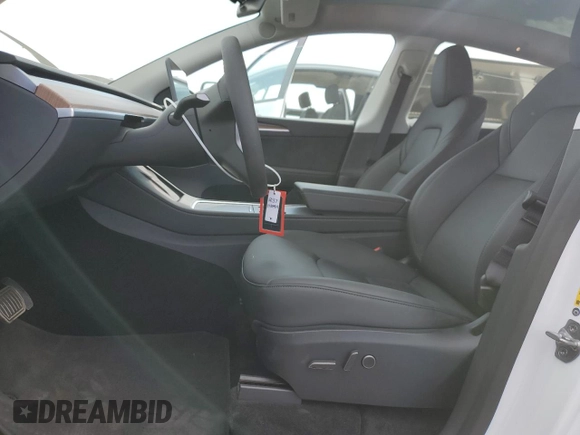 2025 Tesla Model Y Long Range with VIN 7SAYGDED6SF271931, listed as a Copart auction lot 43376015 with 261 mi miles and Salvage Title. Bid and sale history available at DreamBid. Image 7.