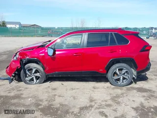 2021 Toyota RAV4 Prime SE with VIN JTMAB3FV2MD059200, listed as a IAAI auction lot 41957023 with 27,451 mi miles. Bid and sale history available at carsss.com. Image 14.