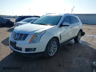 2015 Cadillac SRX Premium Collection with VIN 3GYFNDE35FS545581, listed as a IAAI auction lot 41154403 with 142,146 mi miles. Bid and sale history available at carsss.com. Image 2.