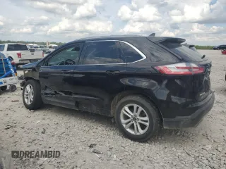 2020 Ford Edge SEL z VIN 2FMPK4J95LBB04706, wystawiony jako Copart lot #56948215 z przebiegiem 69 376 mil mil oraz Czysty tytuł • Clean title. Historia ofert i sprzedaży dostępna na DreamBid. Obrazek 2.