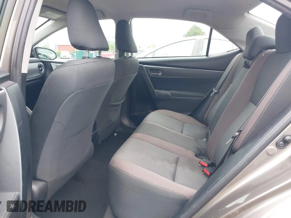 2018 Toyota Corolla L with VIN 2T1BURHE9JC990834, listed as a IAAI auction lot 42583027 with 217,143 mi miles and . Bid and sale history available at DreamBid. Image 8.