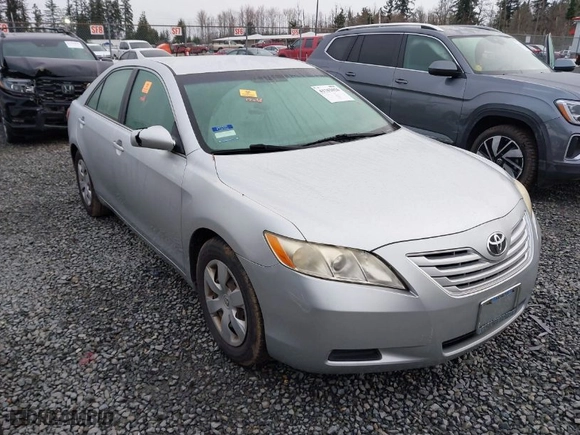 2007 Toyota Camry CE with VIN JTNBE46K573032652, listed as a IAAI auction lot 41762026 with 183,949 mi miles. Bid and sale history available at carsss.com. Image 1.