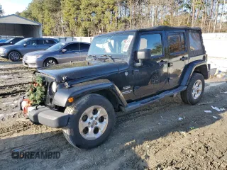 2015 Jeep Wrangler Unlimited Sahara with VIN 1C4BJWEG3FL530114, listed as a Copart auction lot 88851565 with 156,669 mi miles and Salvage Title. Bid and sale history available at carsss.com. Image 1.