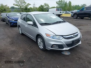 2013 Honda Insight EX z VIN JHMZE2H72DS005201, wystawiony jako IAAI lot #42273982 z przebiegiem 115 282 mil mil oraz . Historia ofert i sprzedaży dostępna na DreamBid. Obrazek 1.