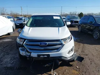 2016 Ford Edge SEL z VIN 2FMPK4J98GBB16208, wystawiony jako IAAI lot #41839634 z przebiegiem 234 597 mil mil oraz . Historia ofert i sprzedaży dostępna na DreamBid. Obrazek 13.