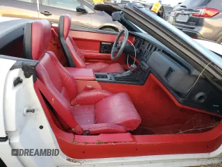 1987 Chevrolet Corvette z VIN 1G1YY3189H5124079, wystawiony jako Copart lot #77180974 z przebiegiem Nie podano mil oraz Szkoda całkowita • Salvage title. Historia ofert i sprzedaży dostępna na DreamBid. Obrazek 10.